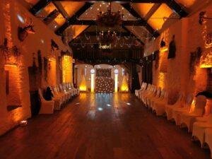 Starlight Wedding Package venue with warm lighting and stylish seating arrangements.