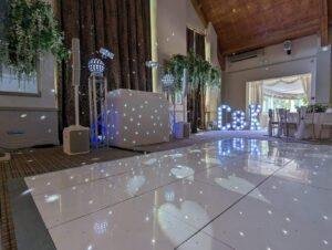 Wedding DJ and lighting setup with Glitz ’n’ Glamour theme at AJ Wedding Entertainment.